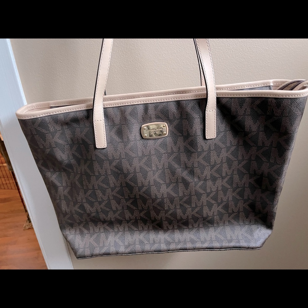Large brown Michael Kors tote bag.